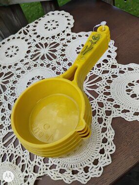 nesting measuring cups set of 4 harvest gold with floral design poss Arrow brand